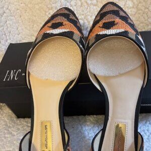 DRESSY FLATS BY INC